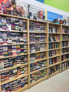 Store display of book shelves full of books