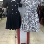 black and white dresses on mannequins inside thrift store as clothing outfit thriftspiration