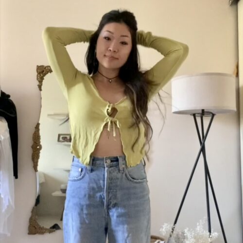 Anna wearing crop top and jeans thrifted outfit