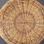 Impact report close-up photo of bottom of wicker basket