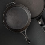 Impact report close-up photo of frying pans