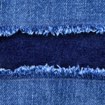 Impact report close-up photo of jeans