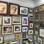 Picture frames hanging on wall at Thrift Store