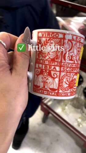Come Thrift With Me for Holiday Gifts & Outfits - Camille holding horoscope mug