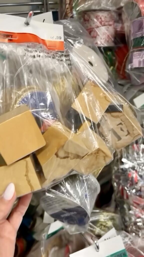 Thrifted bundle of miniature wooden houses unopened