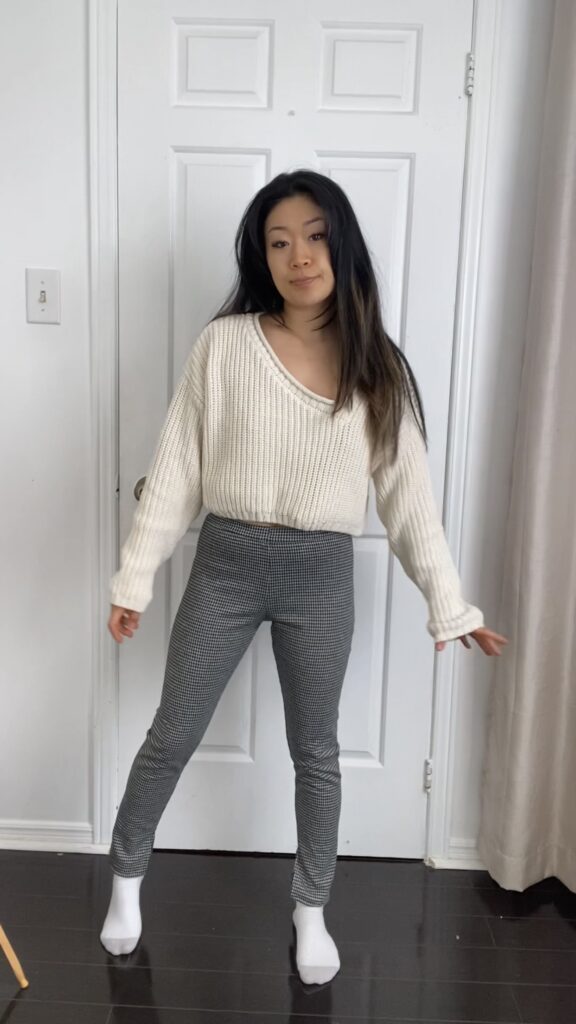 Anna wearing white knit sweater and grey leggings - unstyled look #2