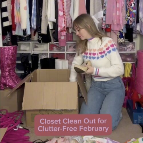 Clutter-Free February: Collaborator Jade placing clothing and shoes into donation box