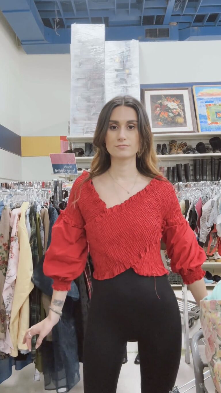 Camille wearing thrifted red long sleeve blouse