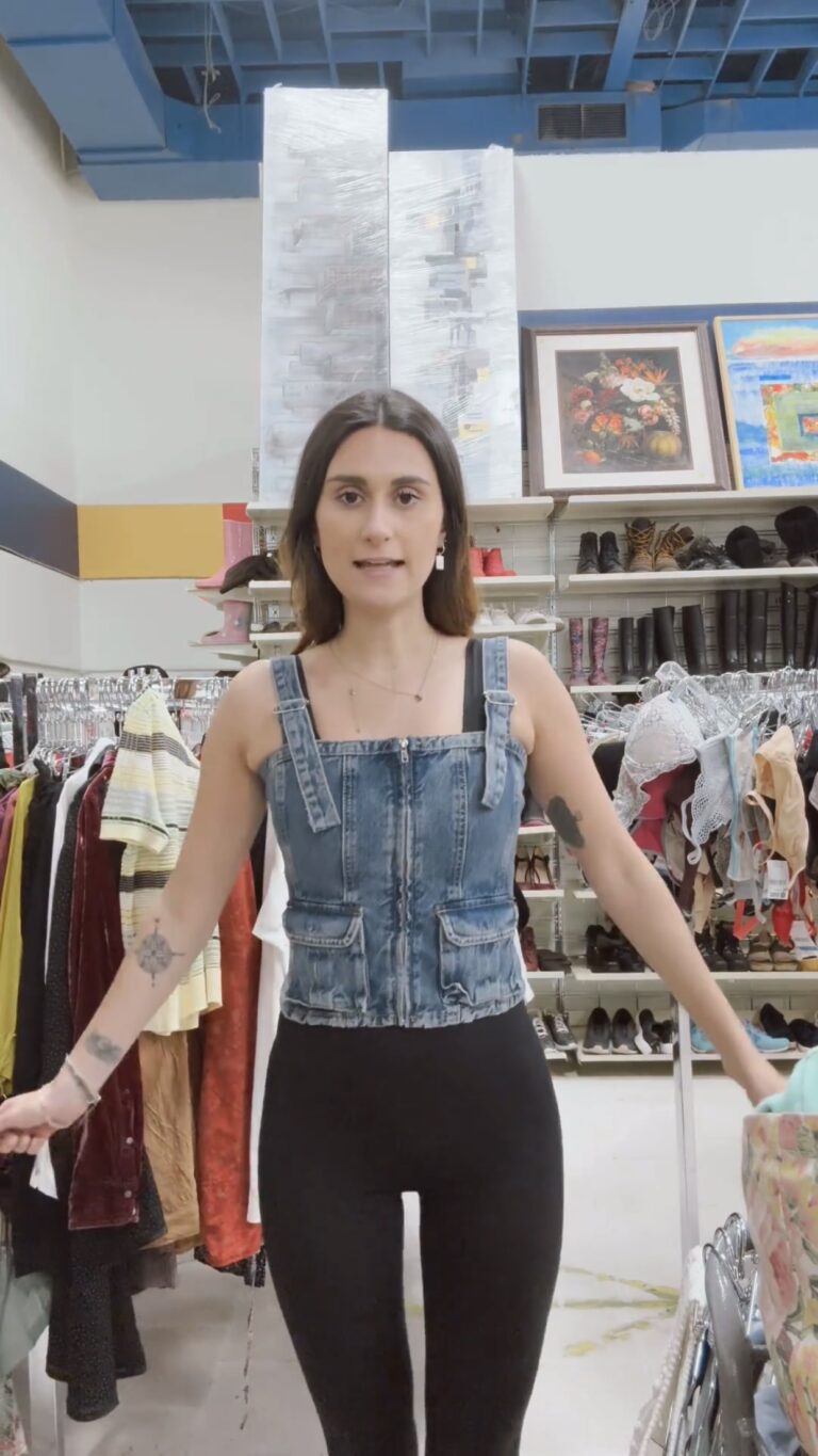 Camille wearing thrifted denim blouse